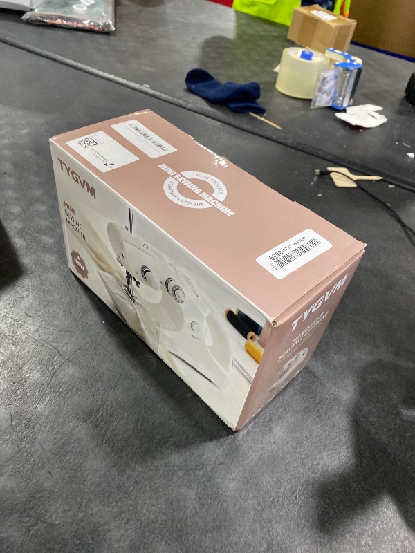 Photo 1 of Portable Cordless Handheld Sewing Machine, 2 Modes for Two-Thread Stitching. Ideal Sewing Machine for Beginners. Mini for Home, Travel, DIY, Mending (Bright White)