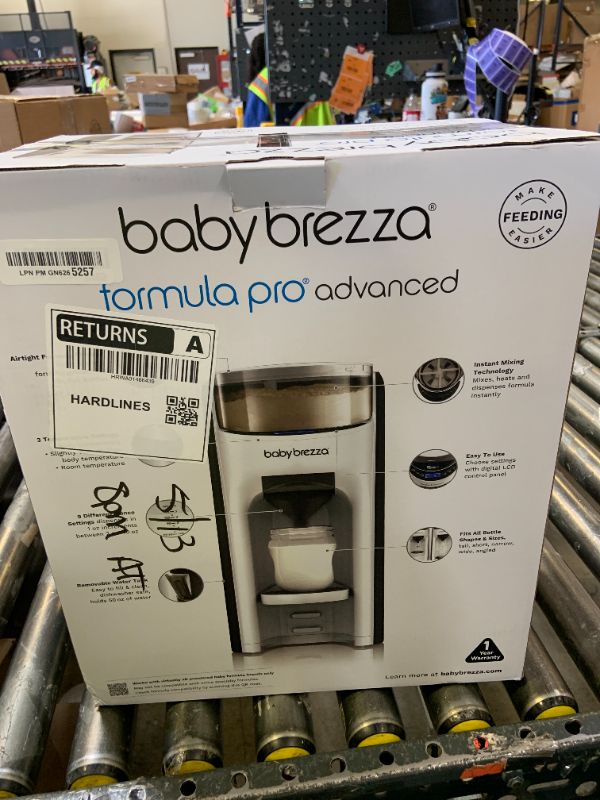 Photo 1 of Baby Brezza New and Improved Formula Pro Advanced Formula Dispenser Machine - Automatically Mix a Warm Formula Bottle Instantly - Easily Make Bottle with Automatic Powder Blending, White