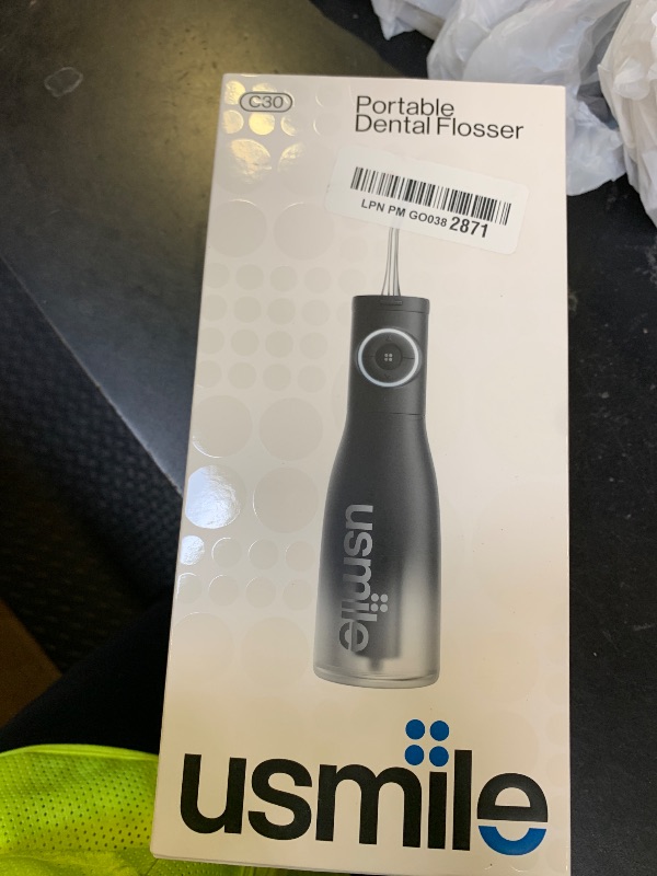 Photo 1 of usmile C30 Cordless Water Flosser, 300ml Large Tank, 5 Pressure Levels Deep Clean, S-Shaped Nozzles for Braces & Sensitive Gums, USB-C Rechargeable, IPX7 Waterproof, Portable Travel & Home Use(Black)