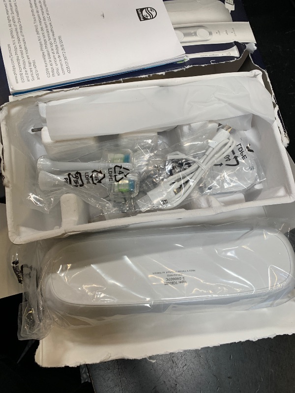 Photo 1 of Philips Sonicare ProtectiveClean 6500 Rechargeable Electric Toothbrush, with Pressure Sensor, 3 Cleaning Modes, SmarTimer and QuadPacer, 14-Day Battery Life, Charging Travel Case, White, HX6462/05