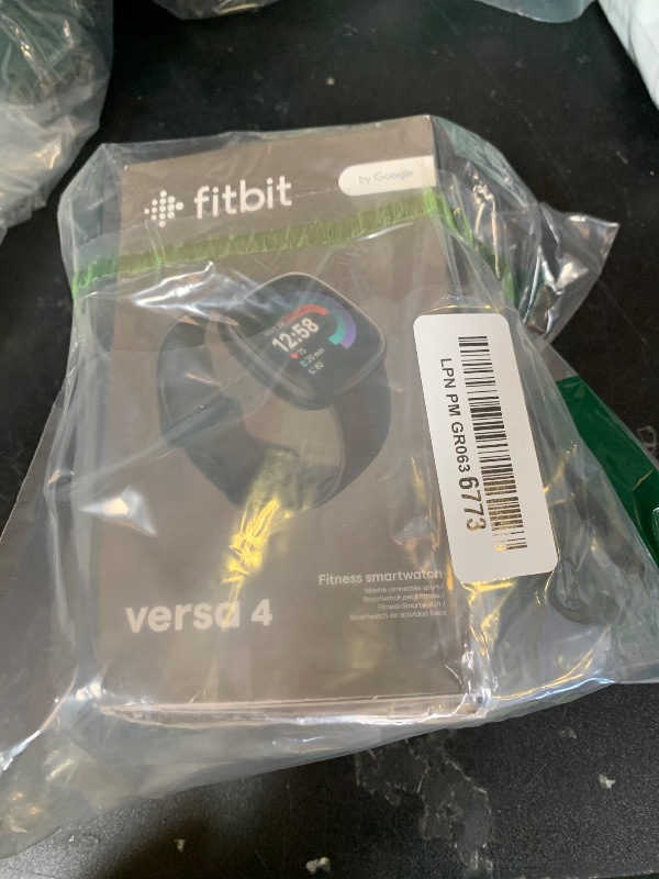 Photo 1 of Fitbit Versa 4 Fitness Smartwatch with Daily Readiness - 3-Month Google Health Premium Membership Included - GPS, 24/7 Heart Rate, 40+ Exercise Modes, Sleep Tracking - Black/Graphite