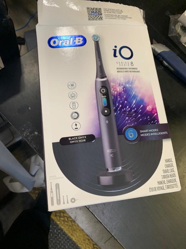 Photo 1 of Oral-B iO Series 8 Electric Toothbrush with 2 Replacement Brush Heads and Travel Case, Rechargeable Toothbrush, Black Onyx