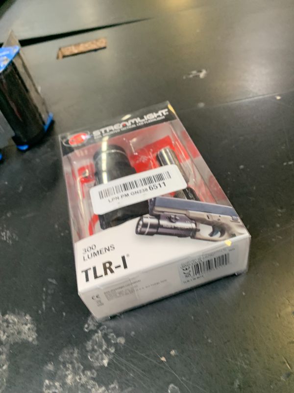 View 2 of Streamlight 69110 TLR-1 300-Lumen 12,000-Candela Rail-Mounted Weapon Flashlight with Rail Locating Keys, Black