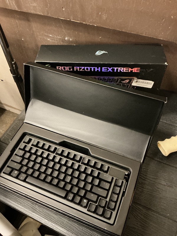 Photo 1 of ASUS ROG Azoth Extreme Wireless Mechanical Gaming Keyboard – 75% TKL, ROG NX Snow Linear Switches, PBT Keycaps, Aluminum Chassis, Carbon Fiber, Gasket Mount, Color OLED Screen, PC/Mac Support - Black