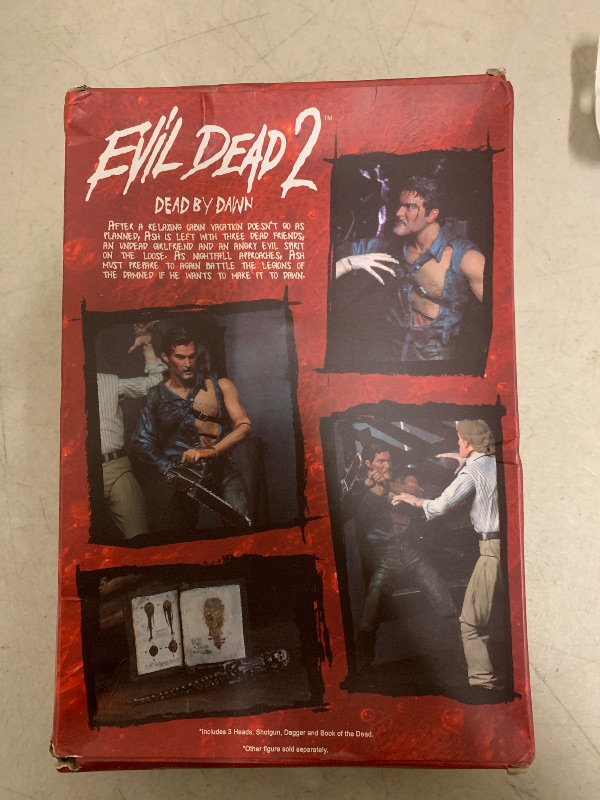View 4 of NECA Evil Dead 2 7" Ultimate Hero Ash Action Figure - Adult, Male, 7 Inch, Red, Black - Includes Three Interchangeable Heads, Chainsaw, Axe, Shotgun, Lantern, Tape Player