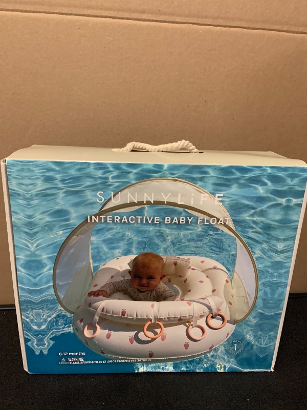 Photo 1 of SUNNYLiFE Baby Float with Canopy — UPF40 Infant Pool Float, Adjustable Fabric Seat, 4 Silicone Play Rings | 6-12 Months - Strawberry Sunshine Pink