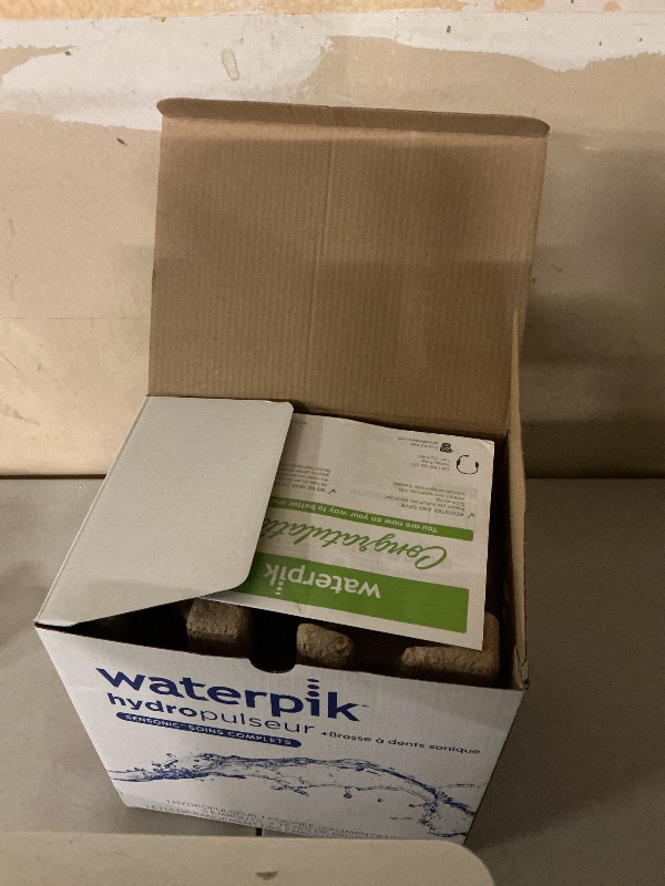 Photo 1 of Waterpik Sensonic Complete Care Water Flosser and Rechargeable Electric Toothbrush Combo Set for Teeth Cleaning and Flossing, CC-04, White, Packaging May Vary