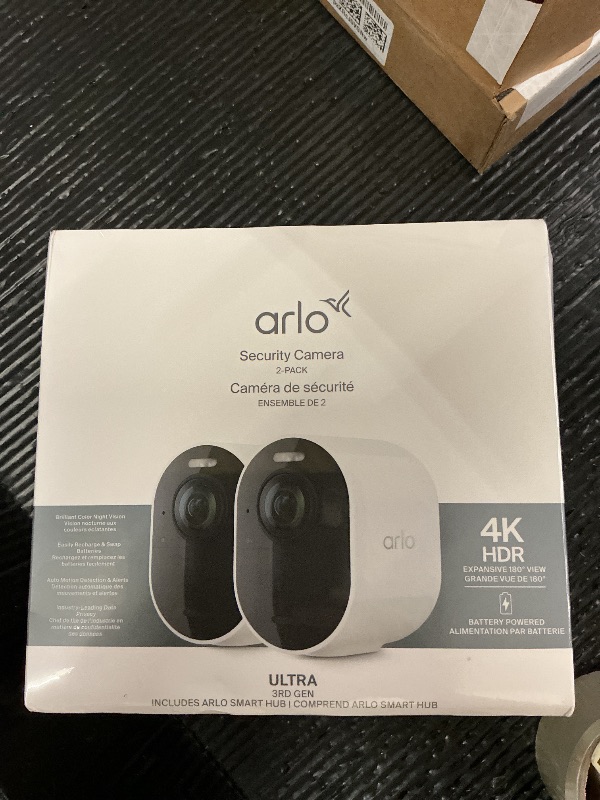 Photo 1 of FACTORY SEALED—- Arlo Ultra Security Camera 4K HDR (3rd Gen, 2025 Release) + SmartHub, Battery Power, Emergency Response, AI Event Captions, 1-Month Trial of Secure Plan, 180° Field of View, 2 Cam, White