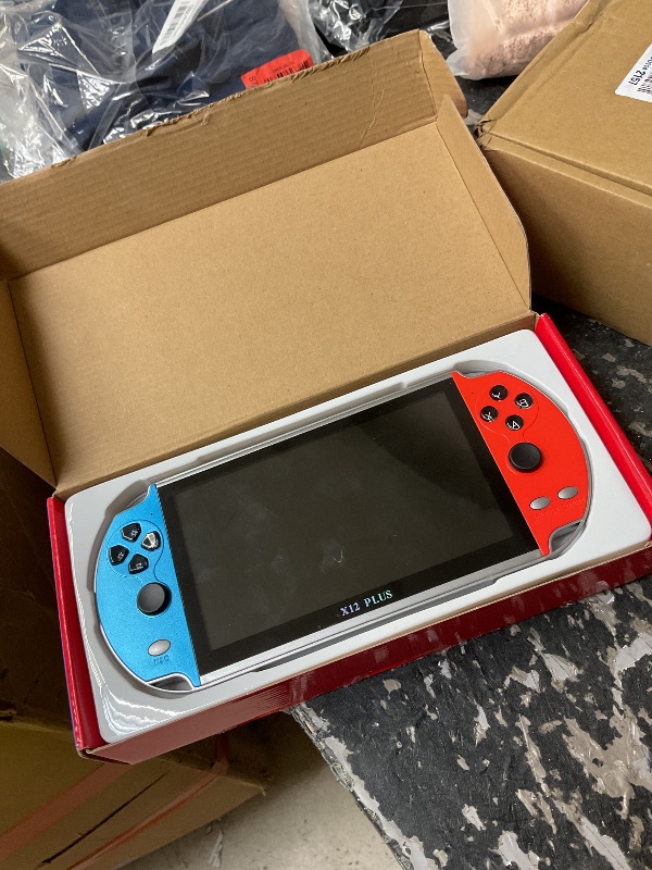 Photo 1 of TCDSTAR Original factory 16GB Retro Handheld Games Player x 12 plus 10000games Portab rechargeable 7 Inch e-book MP5 Video Game Consoles Birthday Gift for Adults and kids toy