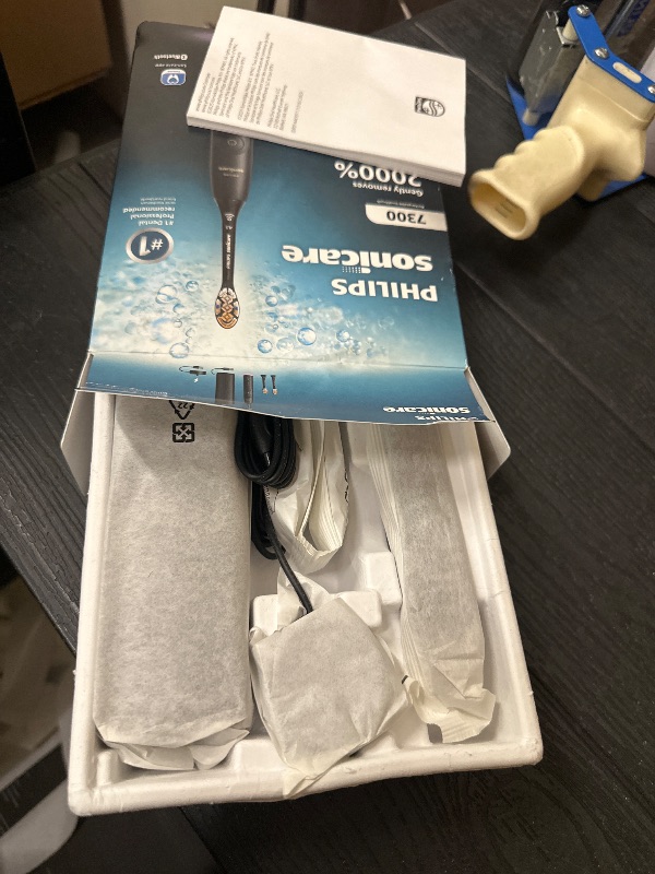 Photo 1 of Philips Sonicare 7300 Series Electric Toothbrush - Next-Generation Sonicare Technology, Pressure Sensor, 12 Brushing Settings, SmarTimer, BrushPacer, 21-Day Runtime, Travel Case, Black, HX7421/07
