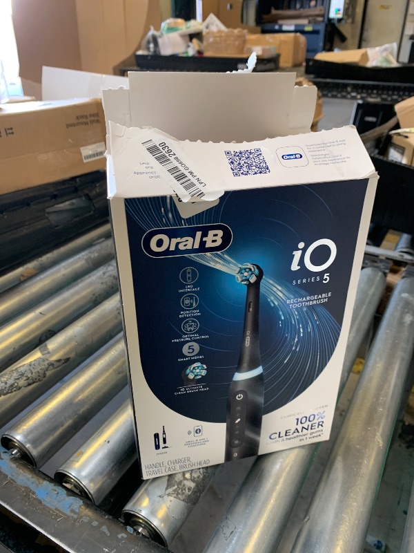 Photo 1 of Oral-B Rechargeable Electric Toothbrush, iO5 Customizable Clean, 5 Cleaning Modes, Visual Pressure Sensor to Protect Gums, Travel Case, Black