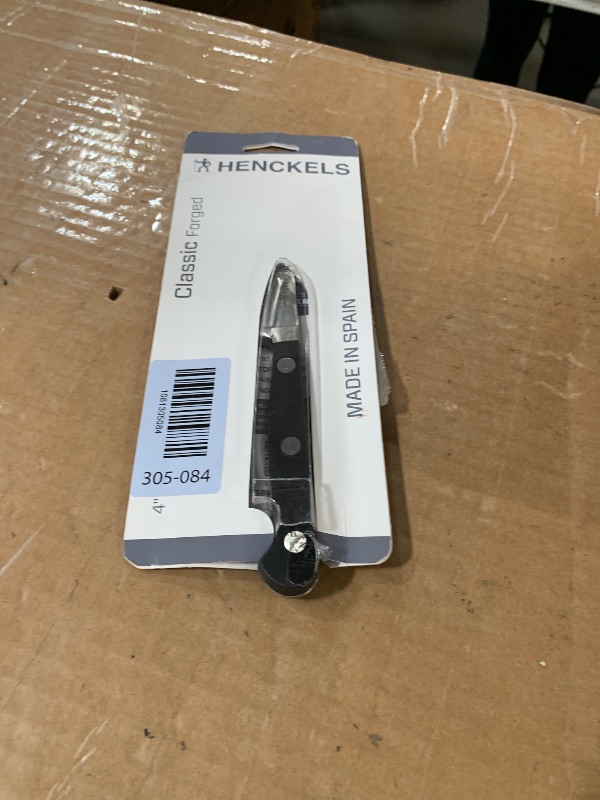 Photo 1 of ***STOCK IMAGE FOR REFERENCE***
Trimmer with 4 7/8" High Carbon Stainless blade and 5 1/8" classic dark brown handle (often called "black") in factory-sealed plastic bag.