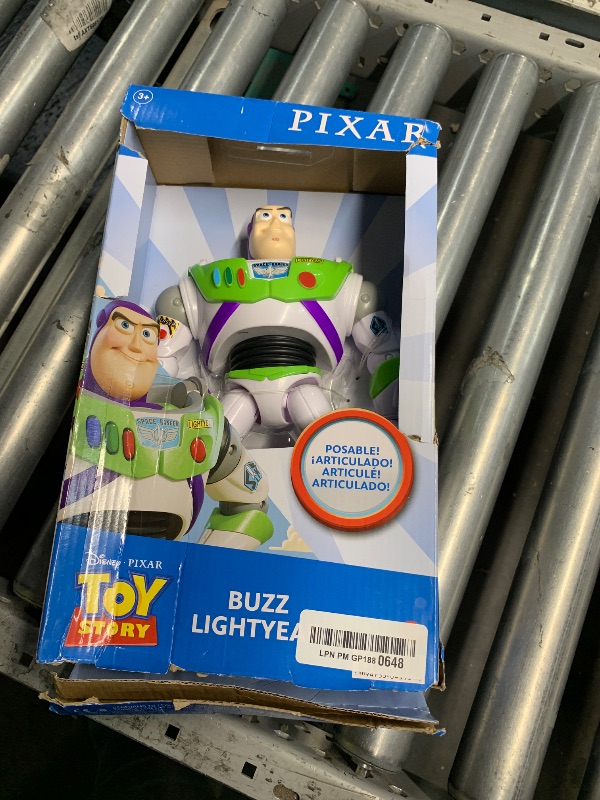 Photo 1 of Mattel Disney Pixar Toy Story Large Action Figure, Posable Buzz Lightyear Collectible in Spacesuit Look, 12-inch Scale