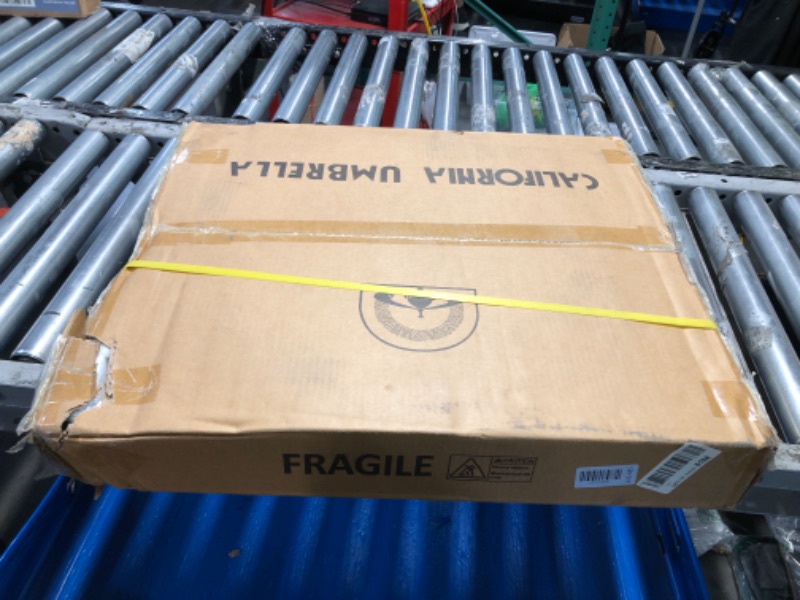 Photo 1 of ***FACTORY SEALED - OPENED FOR INSPECTION*** California Umbrella 50 lbs. Round Concrete Weighted Powdercoated Steel Umbrella Base, White Frame