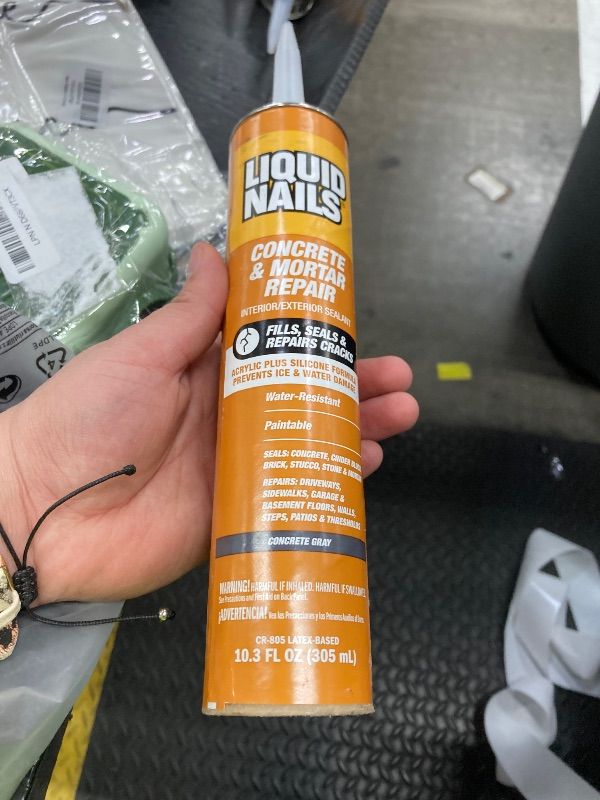 Photo 1 of ***PRICE SHOULD READ AS $5.84***Liquid Nails Tough Repair 10.3 oz. Gray Interior and Exterior Concrete and Mortar Repair Adhesive***PRICE SHOULD READ AS $5.84***