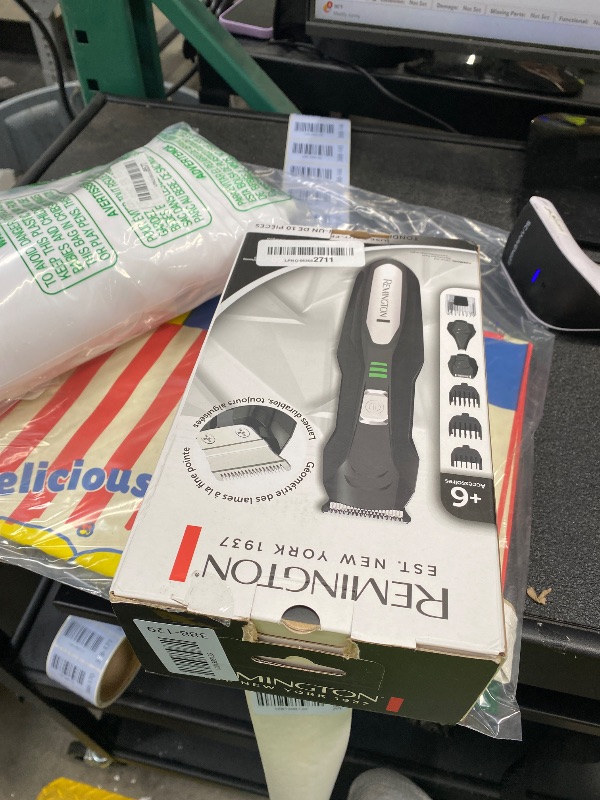 Photo 1 of ***MISSING PIECES -SELLING AS PARTS ONLY***Remington All-in-One Grooming Kit, Lithium Powered, 8 Piece Set with Trimmer, Men's Shaver, Clippers, Beard and Stubble Combs, PG6025, Black