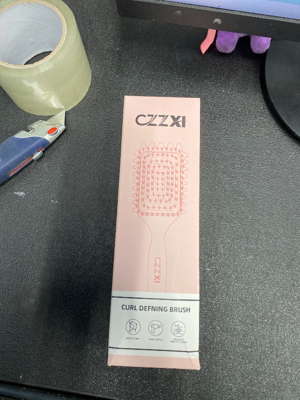 Photo 1 of curl defning brush