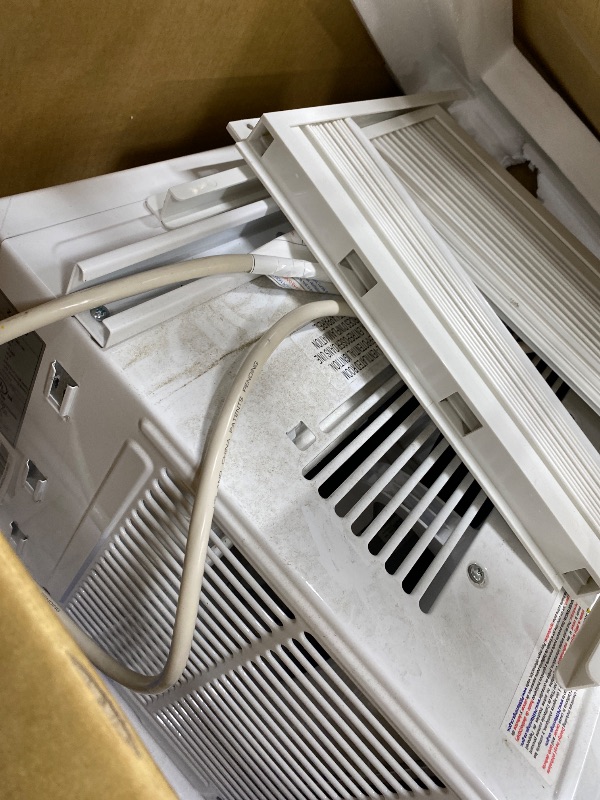 Photo 1 of ***DAMAGED -NON-FUNCTIONAL SELLING AS PARTS ONLY*** ZAFRO 10000 BTU Window Air Conditioner Unit Cools Up to 450 Sq.Ft.,Window AC Units with Dehumidifier, 4 Fan Speed, Energy Saving with Remote for Bedroom,Small Rooms,White