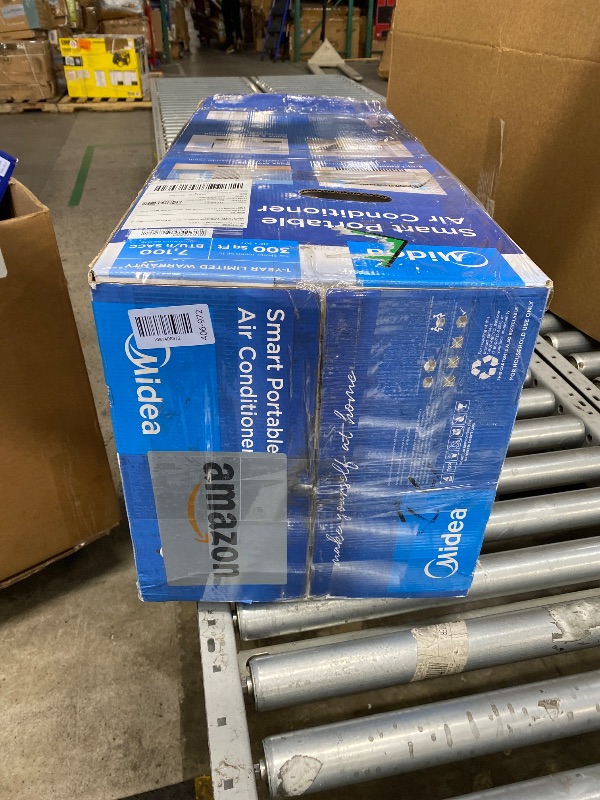Photo 1 of ****Unit does not power on. Broken / DOA***Midea 10,000 BTU ASHRAE (7,100 BTU SACC) Portable Air Conditioner, Smart Control, Cools up to 300 Sq. Ft., with Dehumidifier & Fan mode, Easy- to-use Remote Control & Window Installation Kit Included