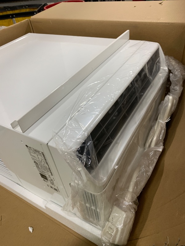Photo 1 of LG 6000 BTU Window Air Conditioner Energy Saving Dual Inverter, Remote Control, WiFi, LG ThinQ, Alexa, Hey Google Enabled Washable Filer Ultra-Quiet Cools Small Room up to 250 Sq.Ft White LW6023IVSM