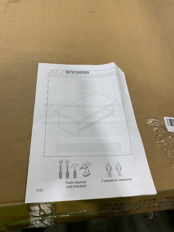 Photo 1 of NON-FUNCTIONAL, PARTS ONLY------------------------------------------------------------------------------------------Winkalon 47” Rectangular Coffee Table with Storage Shelf