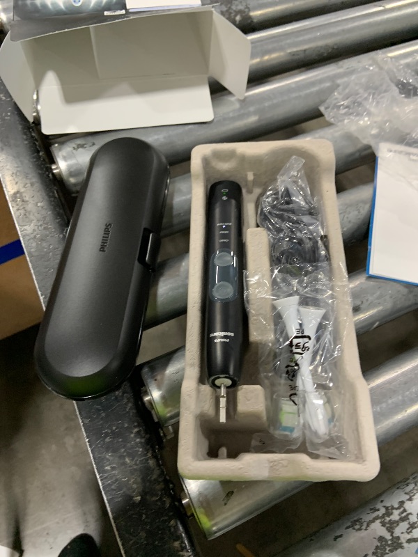 Photo 1 of Philips Sonicare ProtectiveClean 5300 Rechargeable Electric Toothbrush, with Pressure Sensor, 3 Cleaning Modes, SmarTimer and QuadPacer, with 2 Bonus Brush Heads, Travel Case, Black, Model HX6423/34