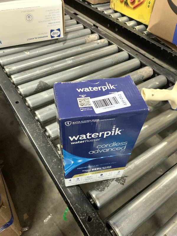 Photo 1 of Waterpik Cordless Advanced 2.0 Water Flosser For Teeth, Gums, Braces, Dental Care With Travel Bag and 4 Tips, ADA Accepted, Rechargeable, Portable, and Waterproof, White WP-580, Packaging May Vary