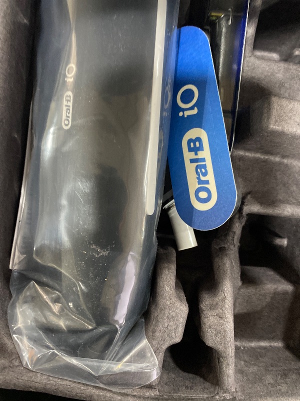 Photo 1 of Oral-B Rechargeable Electric Toothbrush, iO9 Limited Ultimate Clean, 7 Cleaning Modes, Interactive Display, iSense Charger, Charging Travel Case, Visible Pressure Sensor, 3 Brush Heads, Black