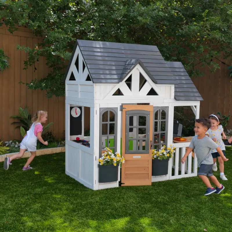 Photo 1 of (2 BOXES) KidKraft Lantana Lane Outdoor Wooden Playhouse with Kitchen and Flap Door (2 BOXES)