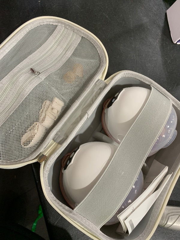 Photo 1 of Hands Free Breast Pump Comfortable, Painless Strong Suction Power Rechargeable Electric Breast Pump Smart App Wearable Pump Leakproof 4 Modes Levels Wireless Pump for Driving Office Yoga Sleeping
