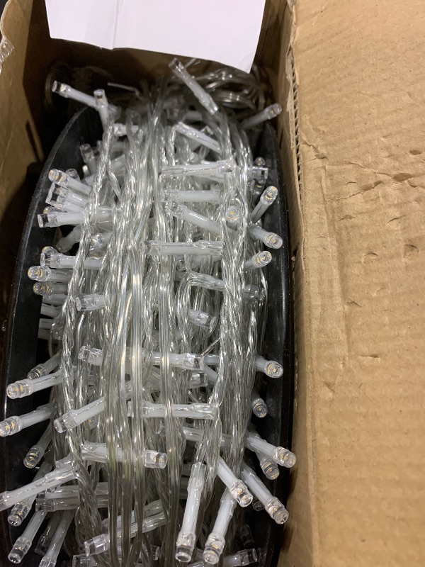 Photo 1 of JMEXSUSS Outdoor Christmas Lights Plug in: 315ft 1200 LED Christmas Tree Lights with Remote - 8 Modes Warm White Xmas String Light for Wedding Holiday Yard Party Indoor Decoration