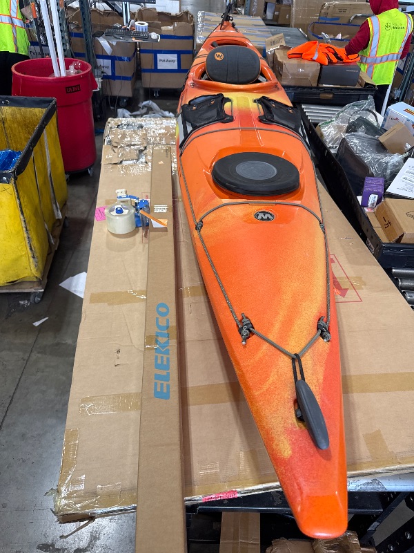 Photo 1 of Wilderness Systems Tsunami 145 | Sit Inside Touring Kayak | Kayak with Rudder | 14' 6" | Mango