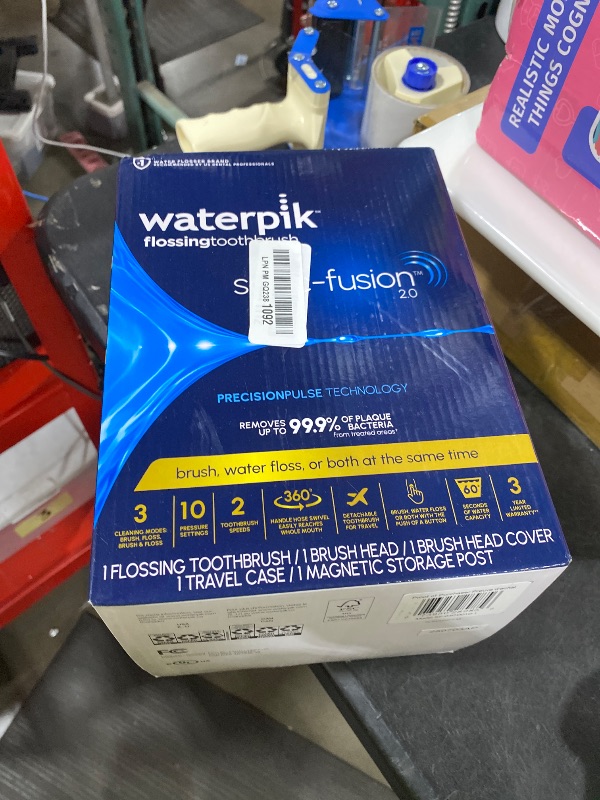 Photo 1 of Waterpik Sonic-Fusion Flossing Electric Toothbrush Water Flosser, White
