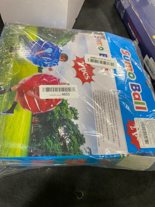 Photo 1 of SUNSHINEMALL 2PC Sumo Balls, Inflatable Body Sumo Balls Bopper Toys for Kids 26" - Heavy Duty PVC Vinyl Suits for Grassland or Other Outdoors Play (2PC Blue+Pink 26inch)