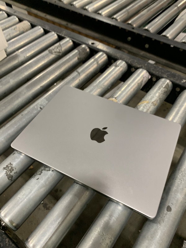 Photo 1 of Apple 2023 MacBook Pro Laptop M3 chip with 8?core CPU, 10?core GPU: Built for Apple Intelligence, 14.2-inch Liquid Retina XDR Display, 8GB Unified Memory, 512GB SSD Storage; Space Gray