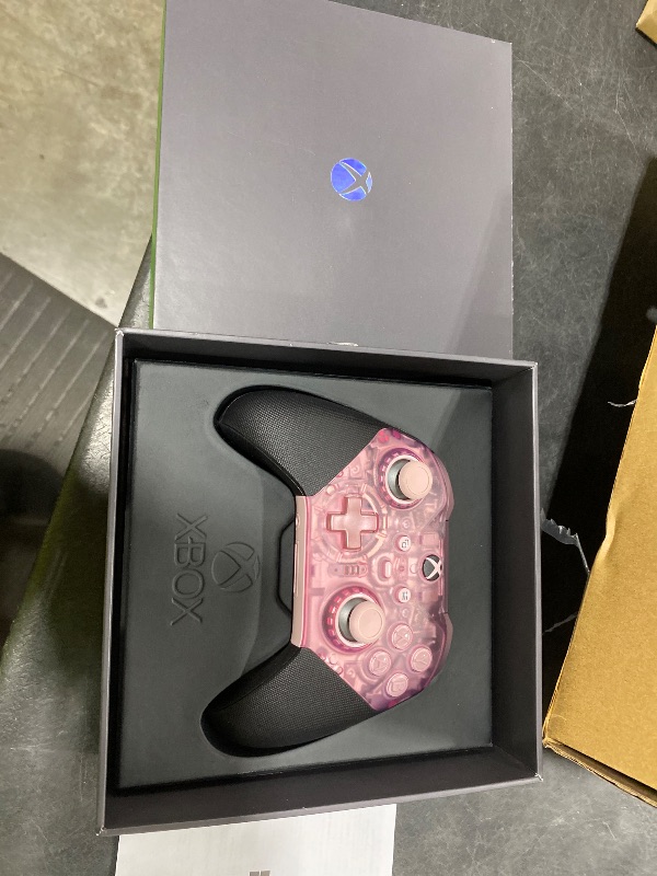 Photo 1 of Xbox Wireless Gaming Controller | Elite Series 2 Core | Translucent Pink | Consoles, PCs, TVs, mobile, and more | Adjustable Thumbsticks | Trigger Locks