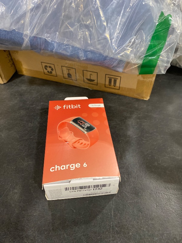 Photo 1 of Google Fitbit Charge 6 - Fitness Tracker - Gold/Coral