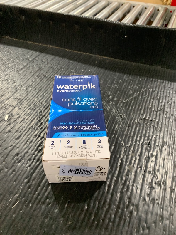 Photo 1 of Waterpik Cordless Pulse 3100 Portable Water Flosser, Rechargeable, White