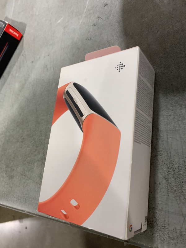 Photo 1 of Google Fitbit Charge 6 - Fitness Tracker - Gold/Coral