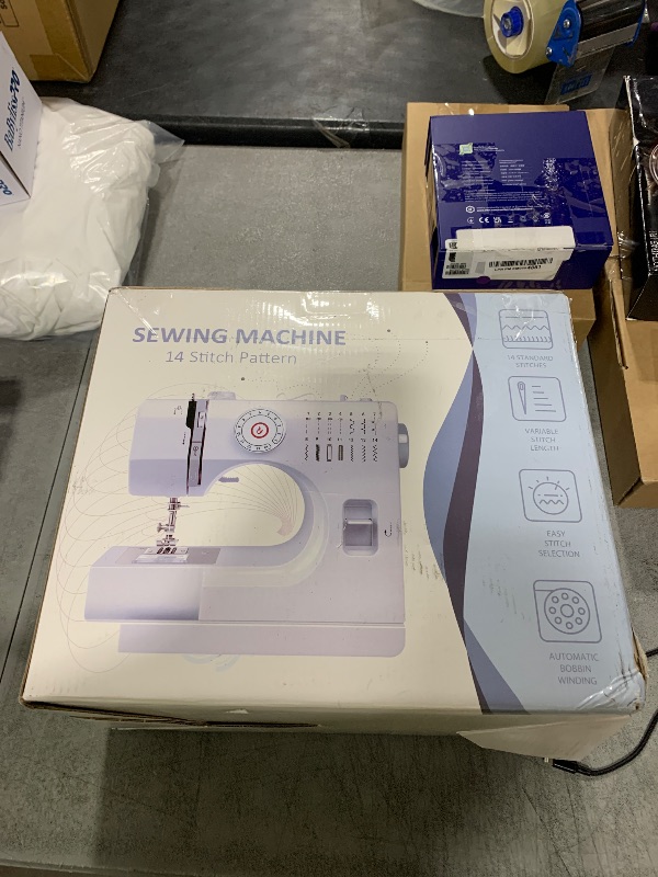 Photo 1 of MJDYTYT Portable Sewing Machine with 14 Stitches