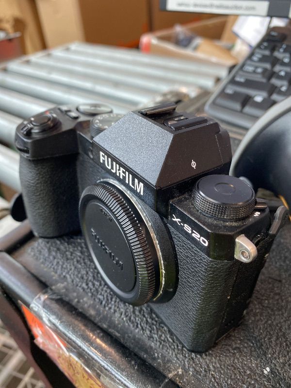 Photo 1 of [MAJOR DAMAGE] [MALFUNCTIONAL] [FOR PARTS] FUJIFILM X-S20 (26 MP, 6.2K 30P, FHD 240P 10x Slo mo, AI Processing,IBIS System, VLOG Mode) with Free TG-BT1 Bluetooth Tripod Hand Grip