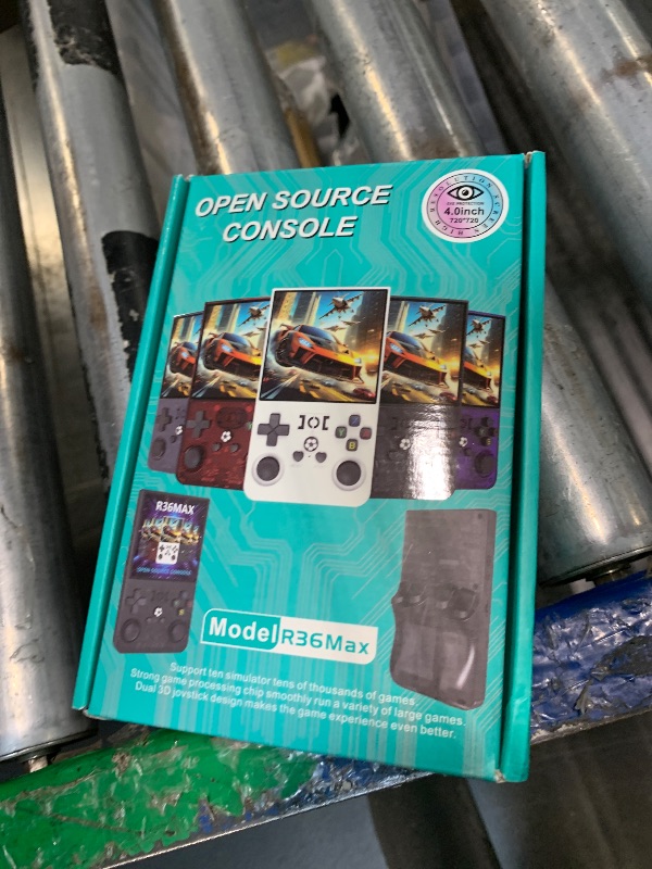 Photo 1 of **DIRTY**
R36MAX Retro Handheld Game Console, Retro Gaming Console with 64G Built-in 18000+ Classic Games, 4.0 Inch 720x720 IPS Screen, Portable Handheld Linux System, 4000mAh Battery (Black)