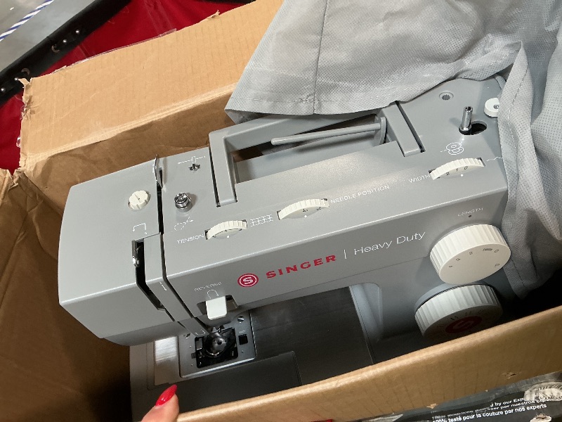 Photo 1 of ***NOT WORKING**** SINGER® Heavy Duty 4423 (Grey) High Speed Sewing Machine + Accessories | 23 Built-In Stitches Deliver 97 Stitch Applications | 50% More Power, 1100 Stitches/Min | Metal Frame, 1-Step Buttonhole