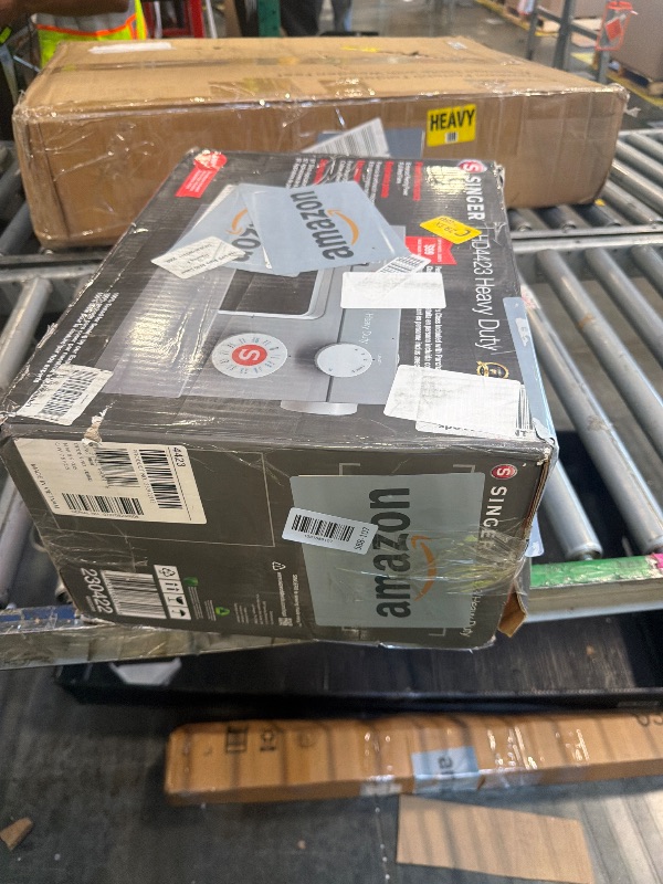 Photo 1 of ***NOT WORKING**** SINGER® Heavy Duty 4423 (Grey) High Speed Sewing Machine + Accessories | 23 Built-In Stitches Deliver 97 Stitch Applications | 50% More Power, 1100 Stitches/Min | Metal Frame, 1-Step Buttonhole