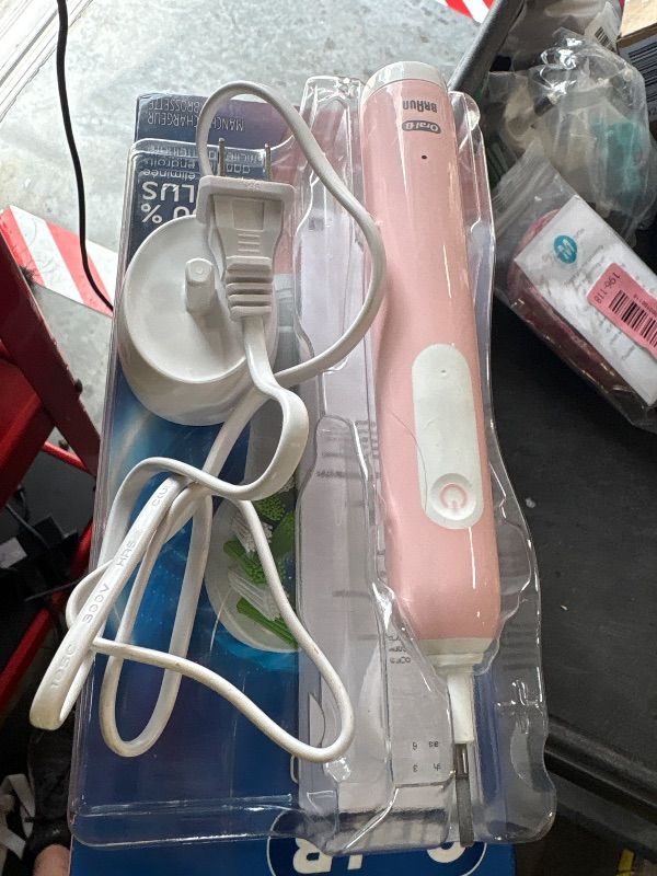 Photo 1 of **MISSING BRUSH HEAD**
Oral-B Pro 1000 Rechargeable Electric Toothbrush, Pink