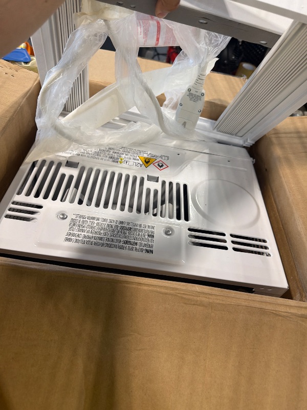 Photo 1 of **Untested**
Amazon Basics 5000-BTU Window Air Conditioner with Quiet Operation, Up to 150 Sqf, Cool and Fan Functions, Washable Filter, Adjustable Window Kit, Intuitive Mechanical Controls, for Small Room, White