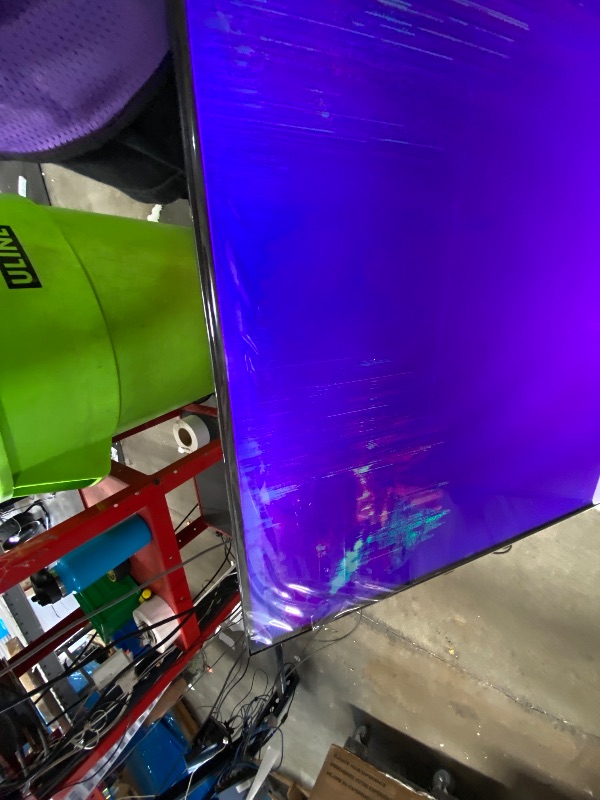 Photo 1 of **SEE PICTURES**Roku 65" QLED 4K Smart TV