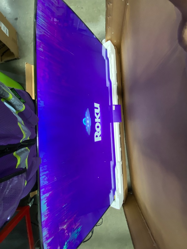 Photo 1 of **SEE PICTURES**Roku 65" QLED 4K Smart TV