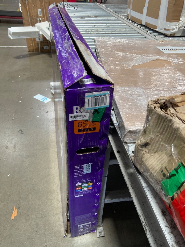 Photo 1 of **SEE PICTURES**Roku 65" QLED 4K Smart TV