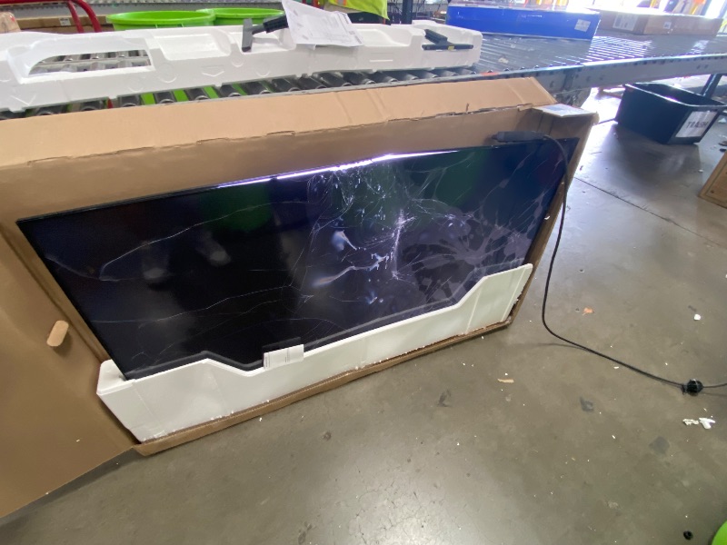 Photo 1 of **SEE PICTURES**Samsung 55" QLED 4K Smart TV